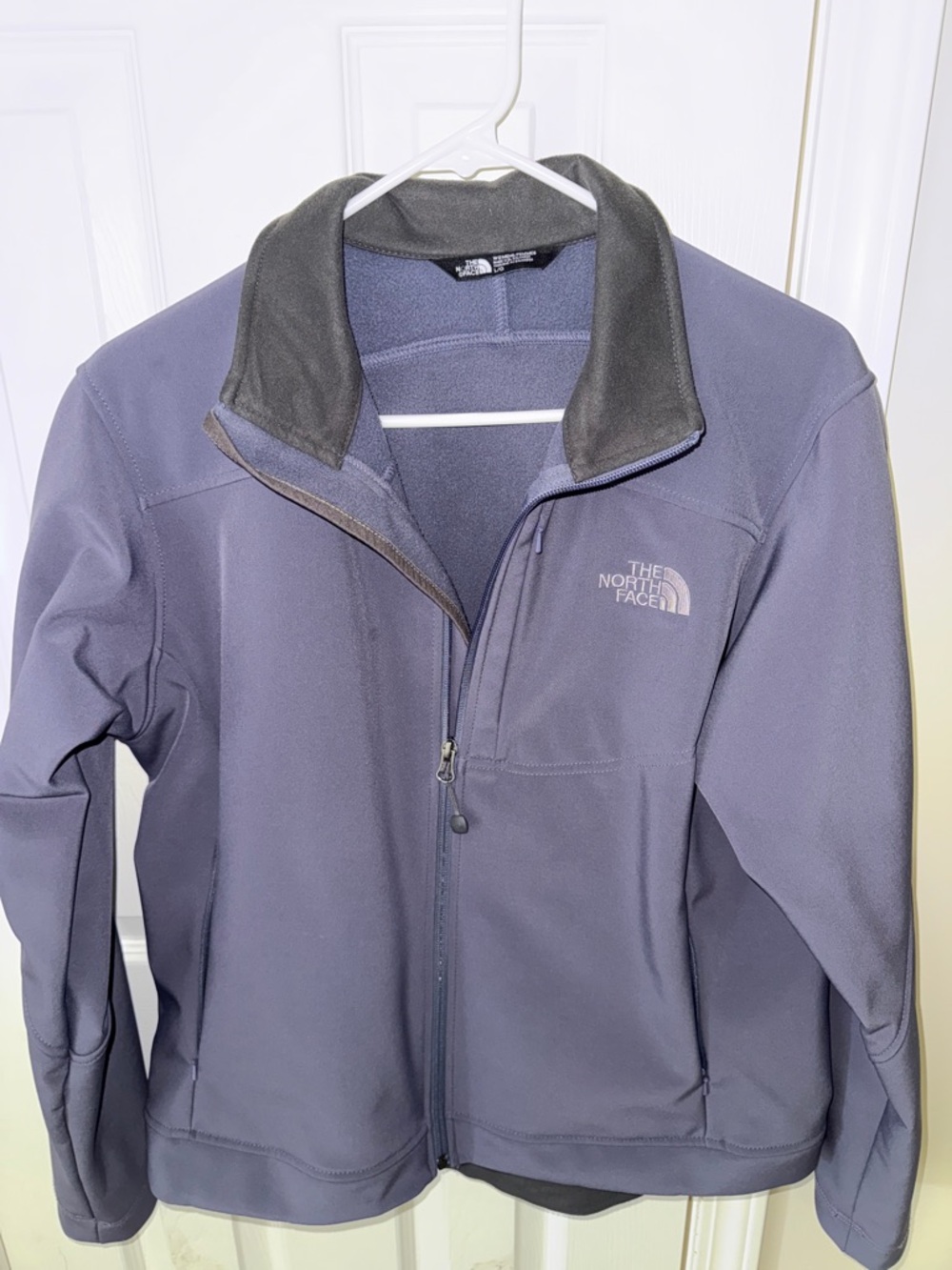 The North Face Women's Purple Softshell Jacket with Dark Gray Collar